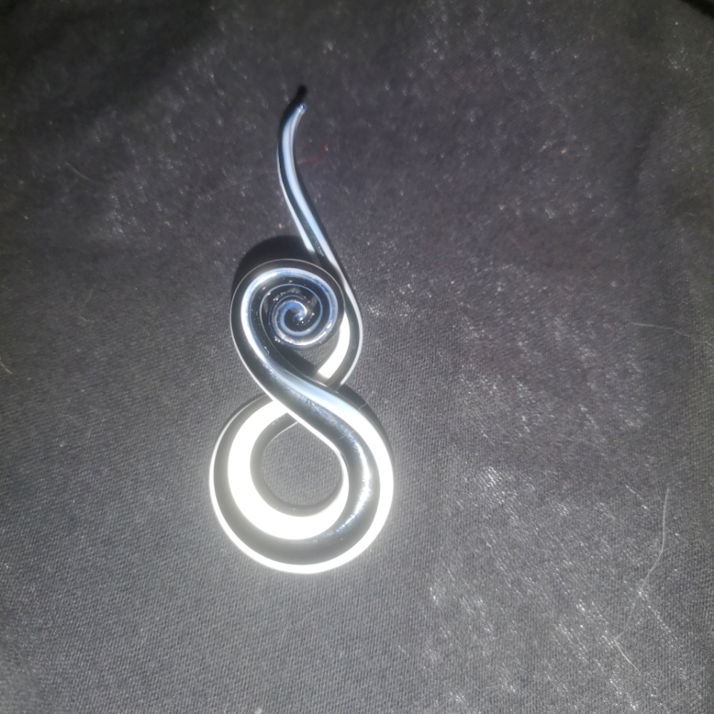 Twisty ear stretchers, I believe the gauge is zero (0)